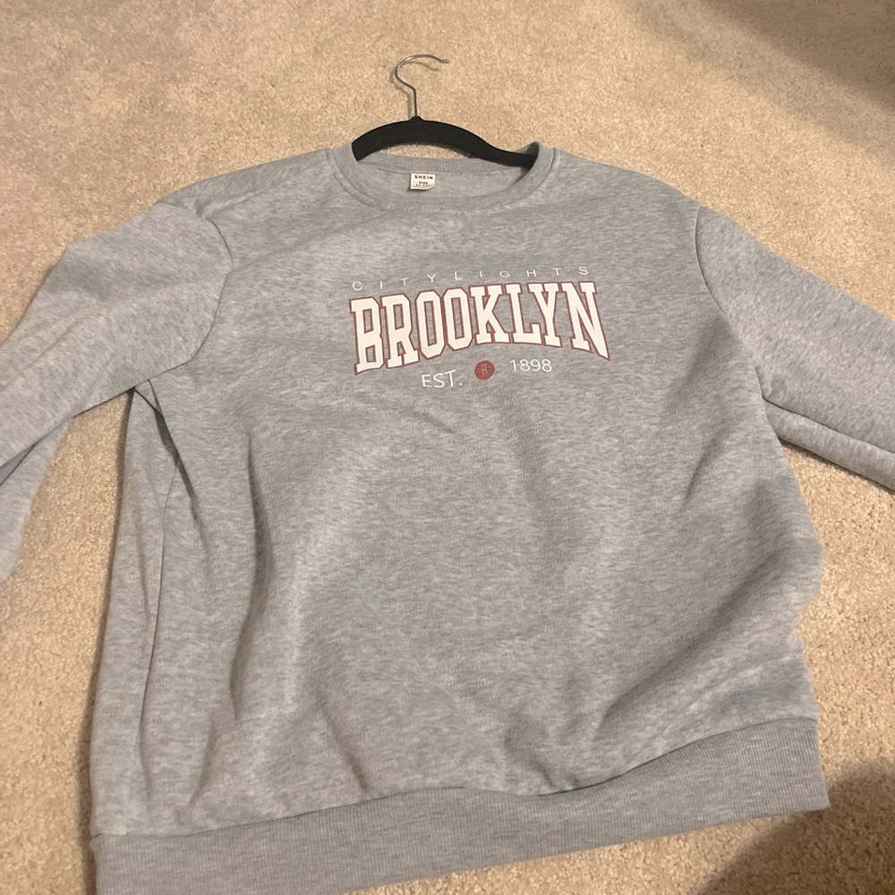 Shein 11-12 yr brooklyn sweatshirt. slightly oversized, never been worn